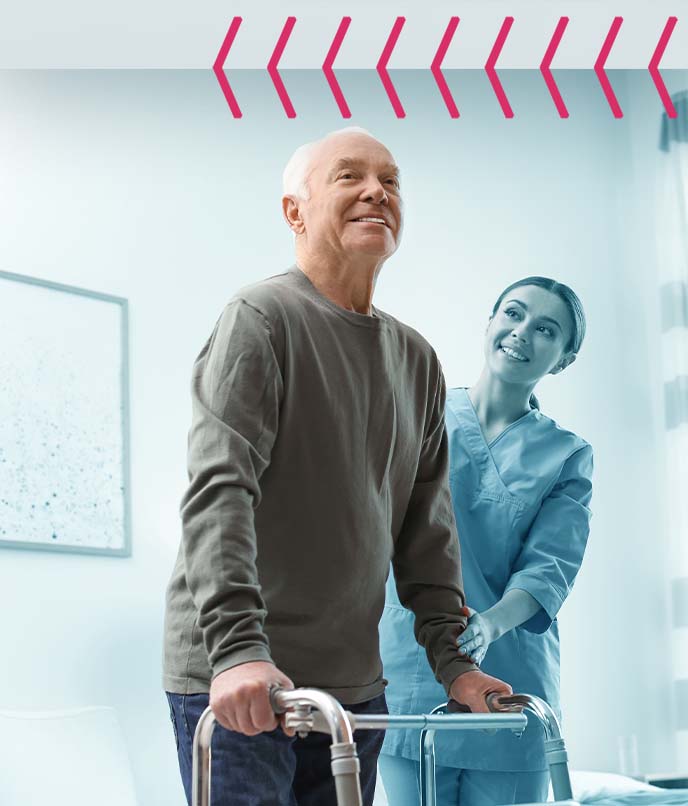 A man being assisted by his nurse after hip replacement surgery